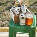 Tröegs FirstCut cans in garden |