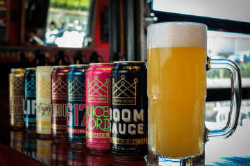 Core Cans with mug | River North Brewing